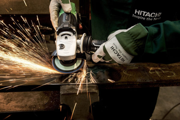 mechanical contractor using a grinder