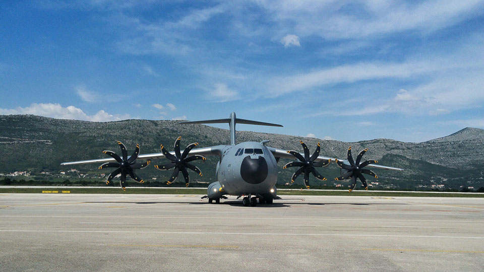 military transport plane on tarmac