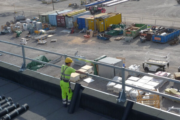 engineer performing preventative maintenance on roof