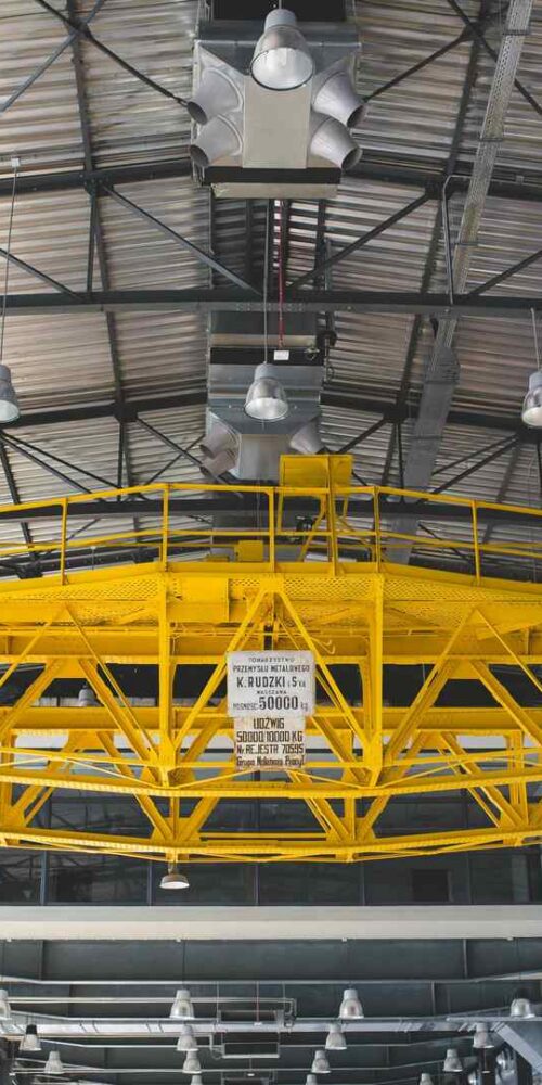 Overhead bridge crane inside an industrial manufacturing facility