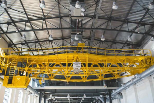 Overhead bridge crane inside an industrial manufacturing facility