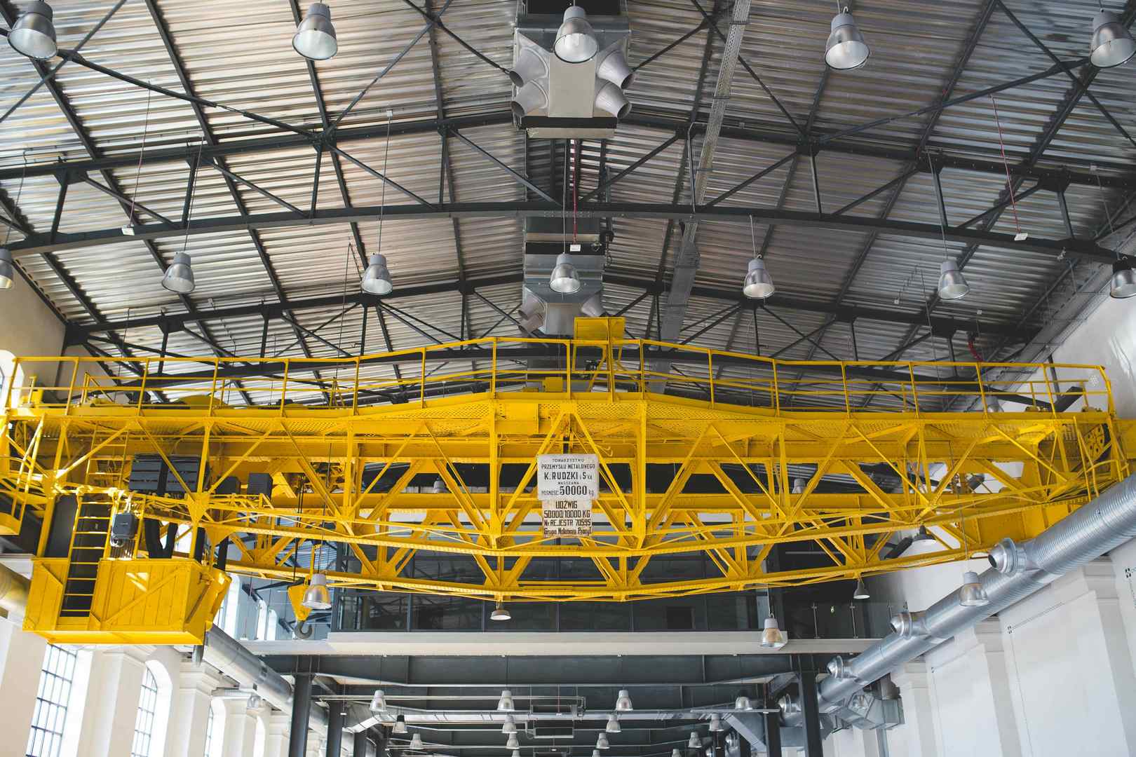 Overhead bridge crane inside an industrial manufacturing facility